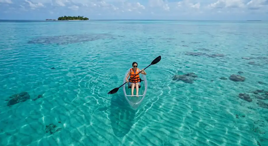 Kayaking activity in the calm crystal clear waters Fairyland Resort